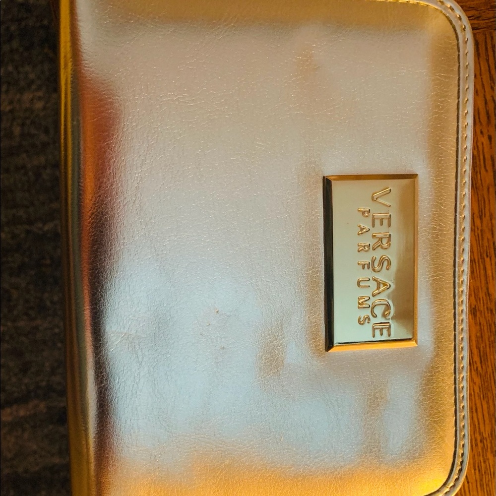 Versace parfums gold ladies wallet.